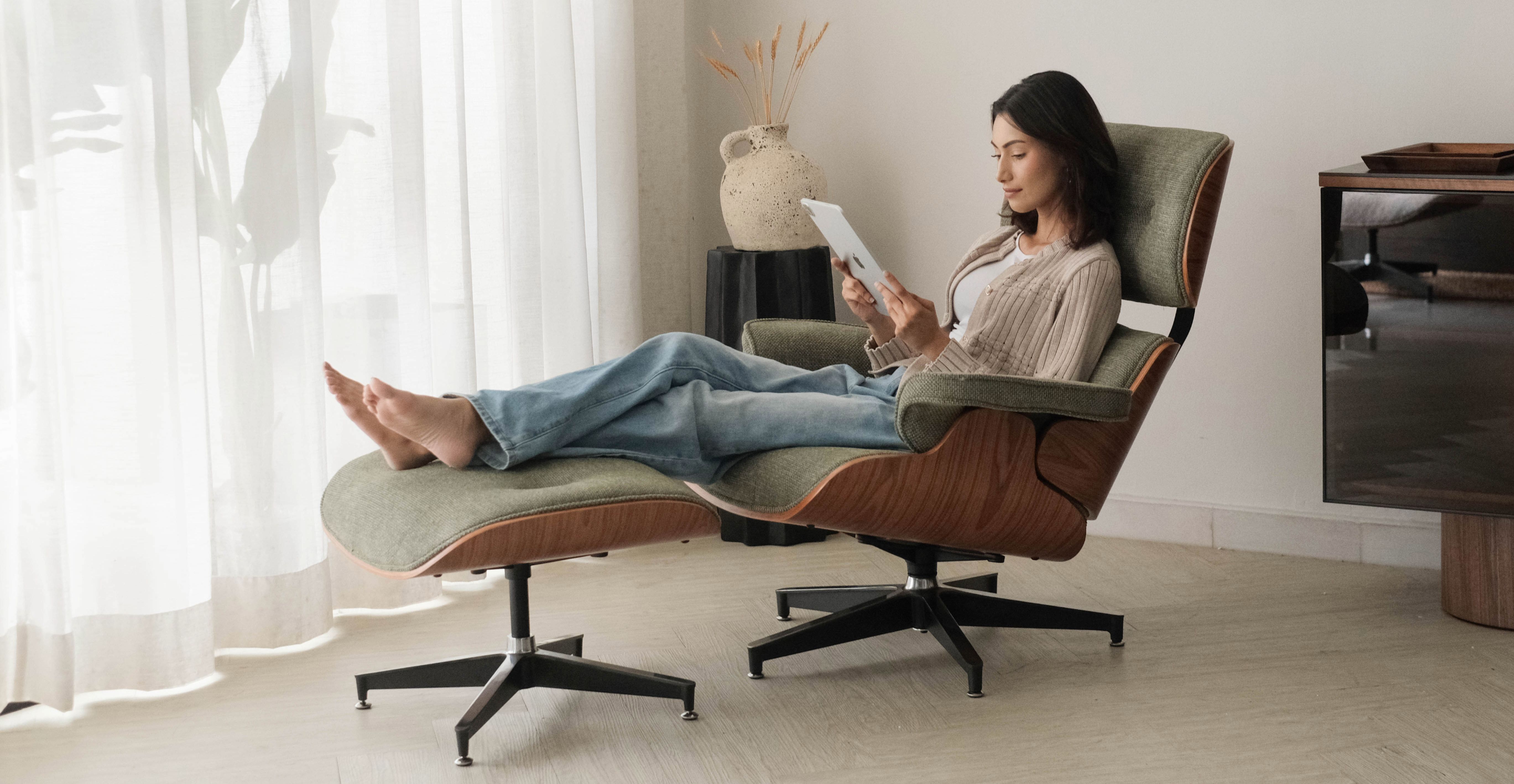 Fabric and wood lounge chair with ottoman for reading corners in Malaysian and Singaporean homes