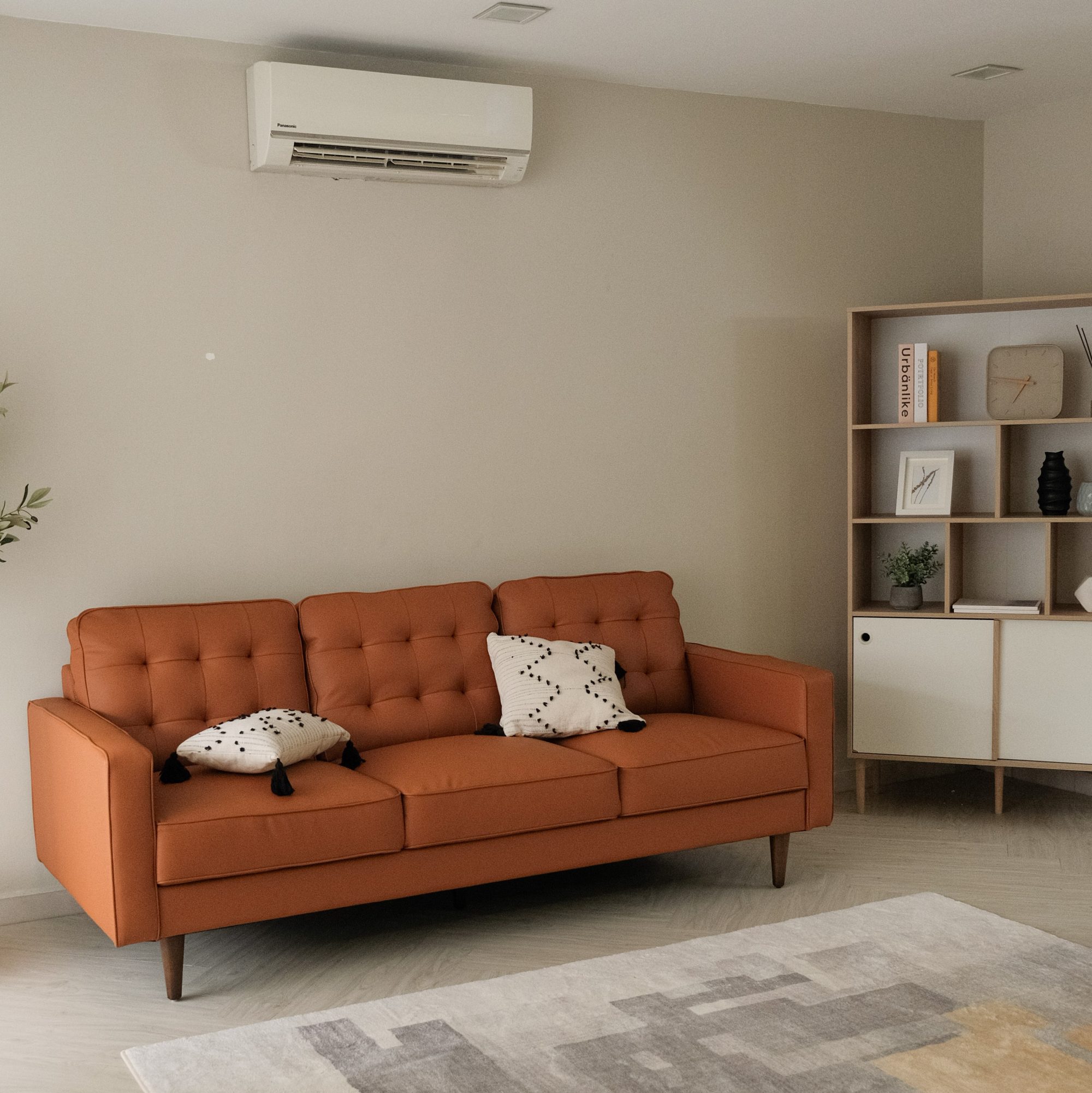 Jane Persimmon mid-century 3-seater sofa styled in a modern living room